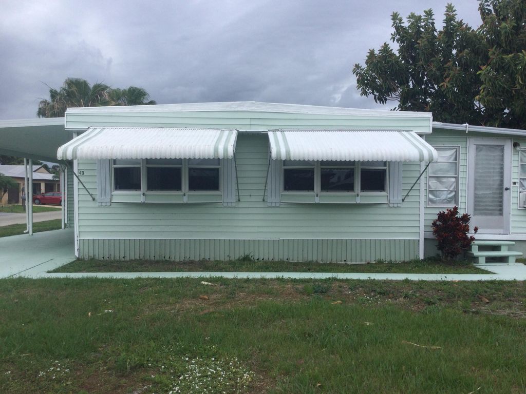 Photo of 40 Monterey Way, Port Saint Lucie, FL 34952 (MLS # RX-11090150)