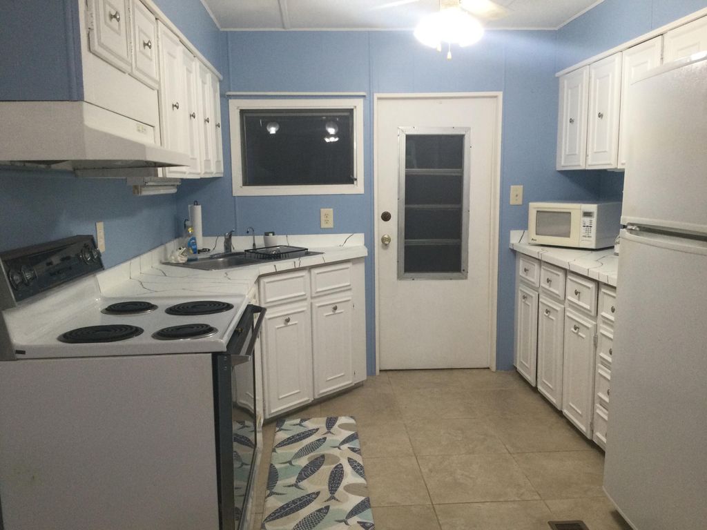 Photo of 40 Monterey Way, Port Saint Lucie, FL 34952 (MLS # RX-11090150)