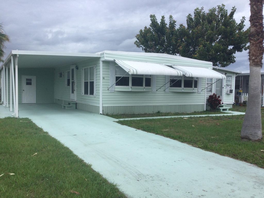 Photo of 40 Monterey Way, Port Saint Lucie, FL 34952 (MLS # RX-11090150)