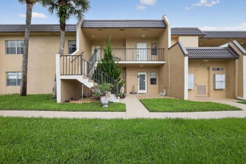 Photo of 100 Lake Meryl Drive #104, West Palm Beach, FL 33411 (MLS # RX-11127445)