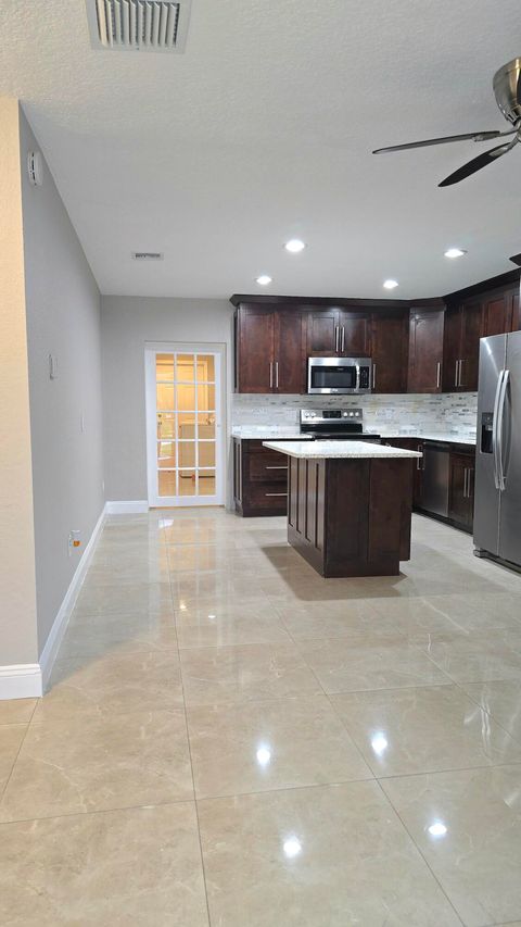 Photo of 5209 Cannon Way, West Palm Beach, FL 33415 (MLS # RX-11126818)