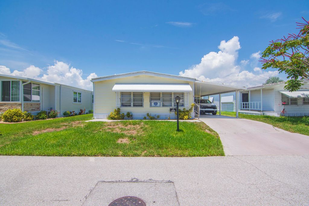 Photo of 106 N Warner Drive, Jensen Beach, FL 34957 (MLS # RX-11093965)