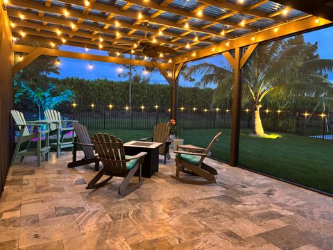 Photo of 19828 Wheelbarrow Bend, Loxahatchee, FL 33470 (MLS # RX-11103257)