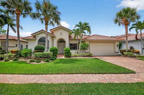 Photo of 9177 Isles Cay Drive, Delray Beach, FL 33446 (MLS # RX-11117682)