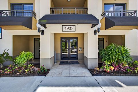 Photo of 4907 Midtown Lane #1413, Palm Beach Gardens, FL 33418 (MLS # RX-11112628)