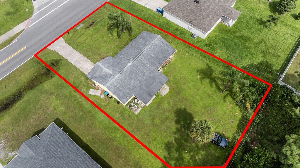 Photo of 219 Eldron Boulevard SE, Palm Bay, FL 32909 (MLS # RX-11122505)