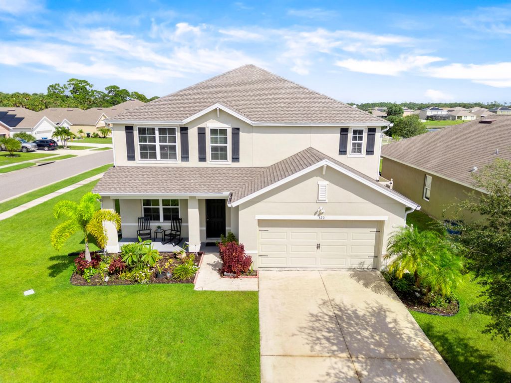 Photo of 320 Moray Drive, Palm Bay, FL 32908 (MLS # RX-11127115)