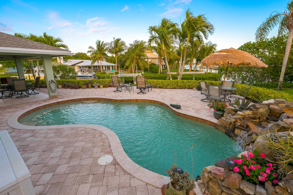 Photo of 4020 SE Whiticar Way, Stuart, FL 34997 (MLS # RX-11081882)