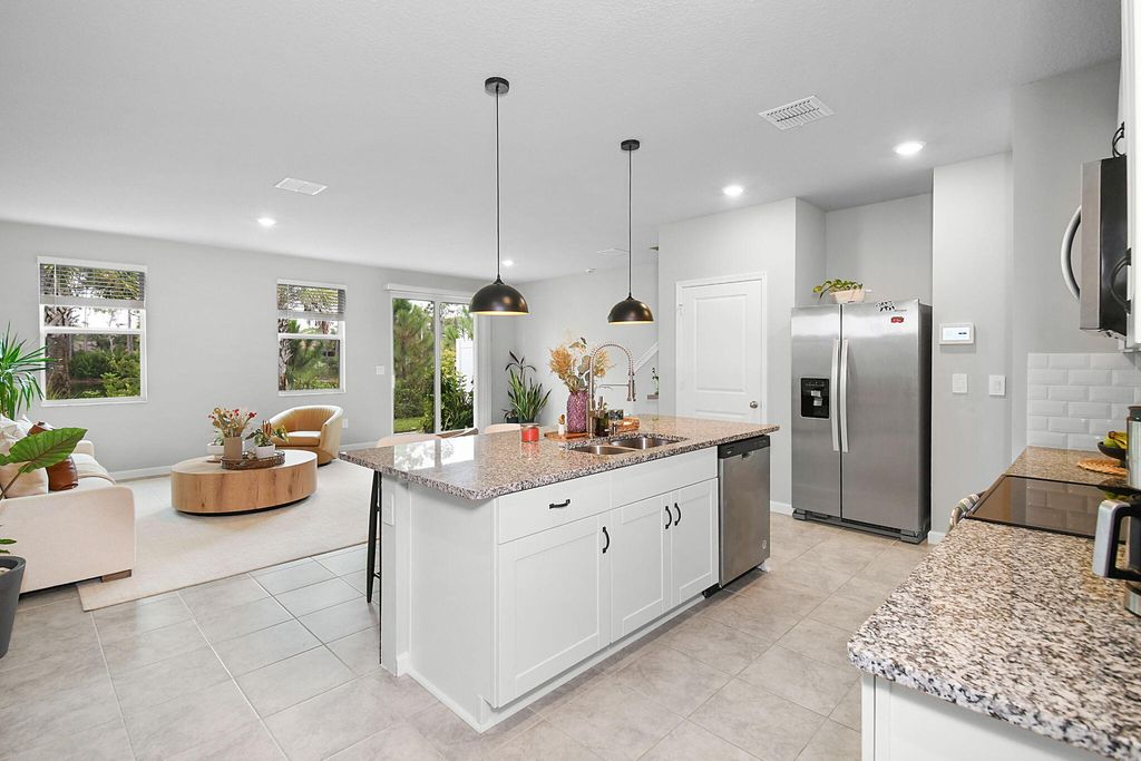 Photo of 5766 SE Edgewater Circle, Stuart, FL 34997 (MLS # RX-11122585)