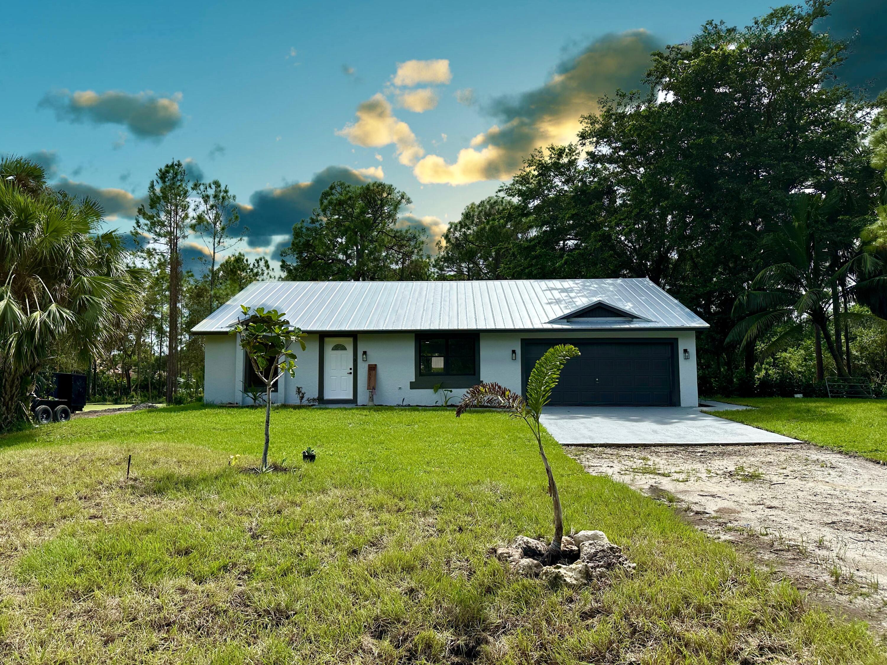 17312 66th Court, The Acreage, Palm Beach County, Florida - 3 Bedrooms  
2 Bathrooms - 