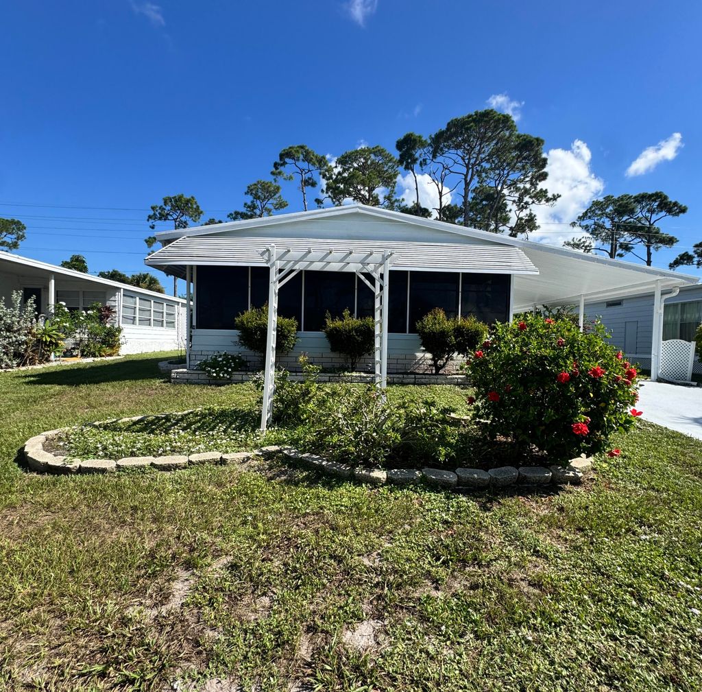 Photo of 19 La Puerta Del Norte, Fort Pierce, FL 34951 (MLS # RX-11116231)