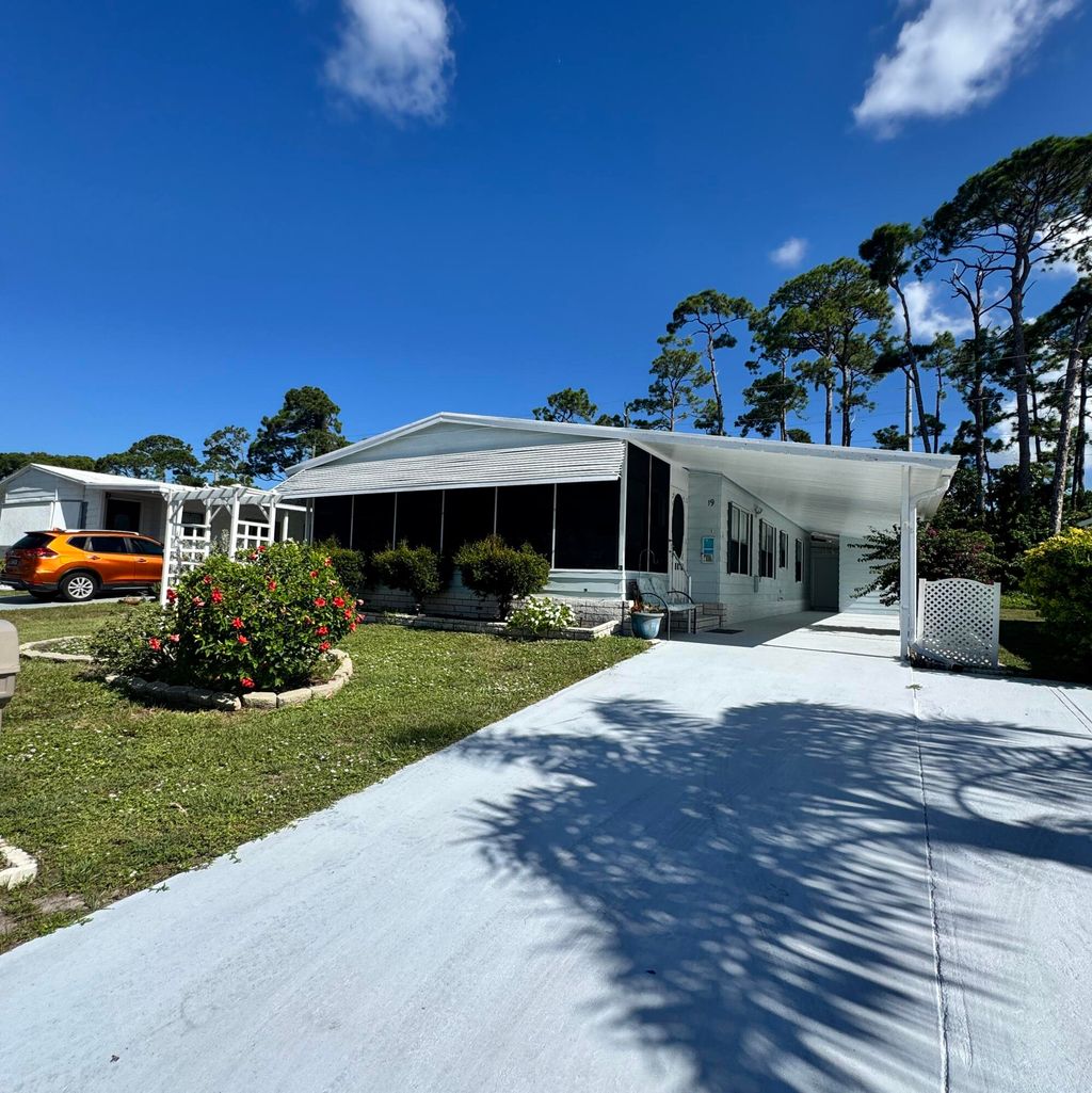 Photo of 19 La Puerta Del Norte, Fort Pierce, FL 34951 (MLS # RX-11116231)