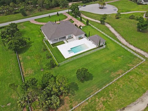 Photo of 10032 Calabrese Trail, Jupiter, FL 33478 (MLS # RX-11097306)