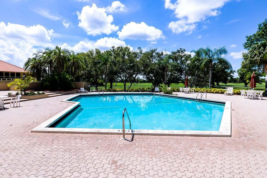 Photo of 9440 Meadowood Drive #102, Fort Pierce, FL 34951 (MLS # RX-10909811)