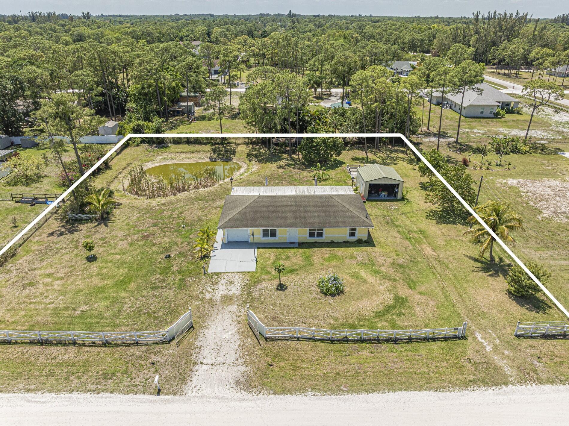 Property for Sale at 17950 44th Place, The Acreage, Palm Beach County, Florida - Bedrooms: 4 
Bathrooms: 2.5  - $595,000