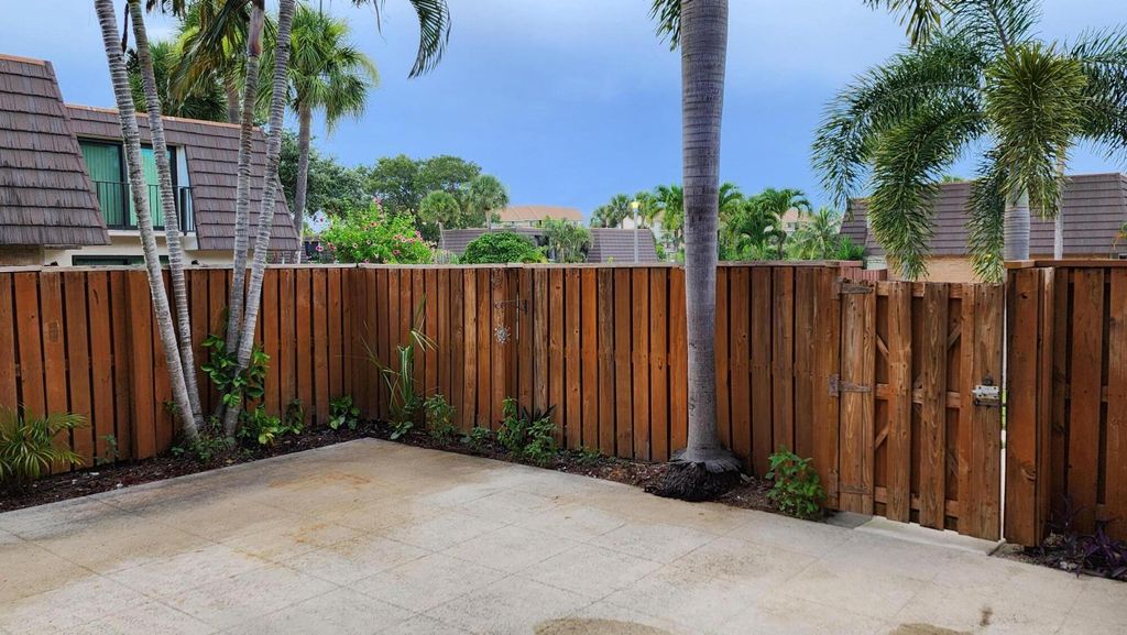 Photo of 2026 20th Court #65a, Jupiter, FL 33477 (MLS # RX-11112591)