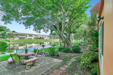 Photo of 105 Oxford 100 #105, West Palm Beach, FL 33417 (MLS # RX-11125436)