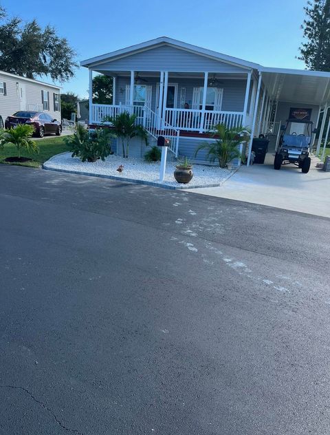Photo of 88 Sandhill Boulevard, Fort Pierce, FL 34982 (MLS # RX-11127223)
