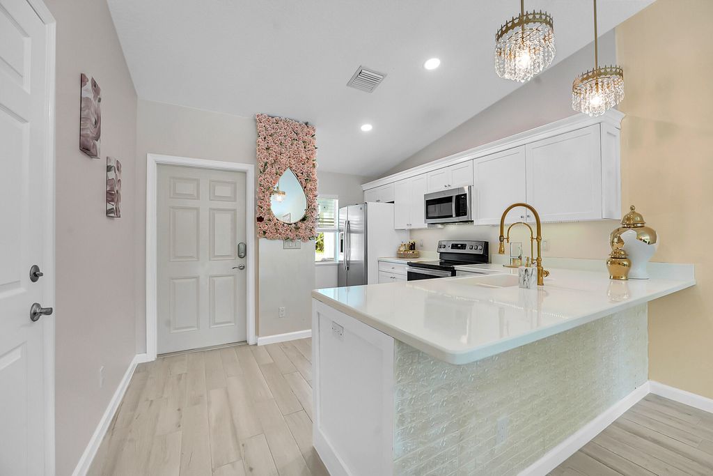 Photo of 5715 SE Pine Drive, Stuart, FL 34997 (MLS # RX-11101533)