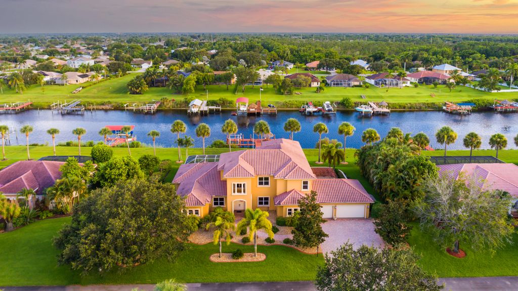 Photo of 2618 SW River Shore Drive, Port Saint Lucie, FL 34984 (MLS # RX-10820538)