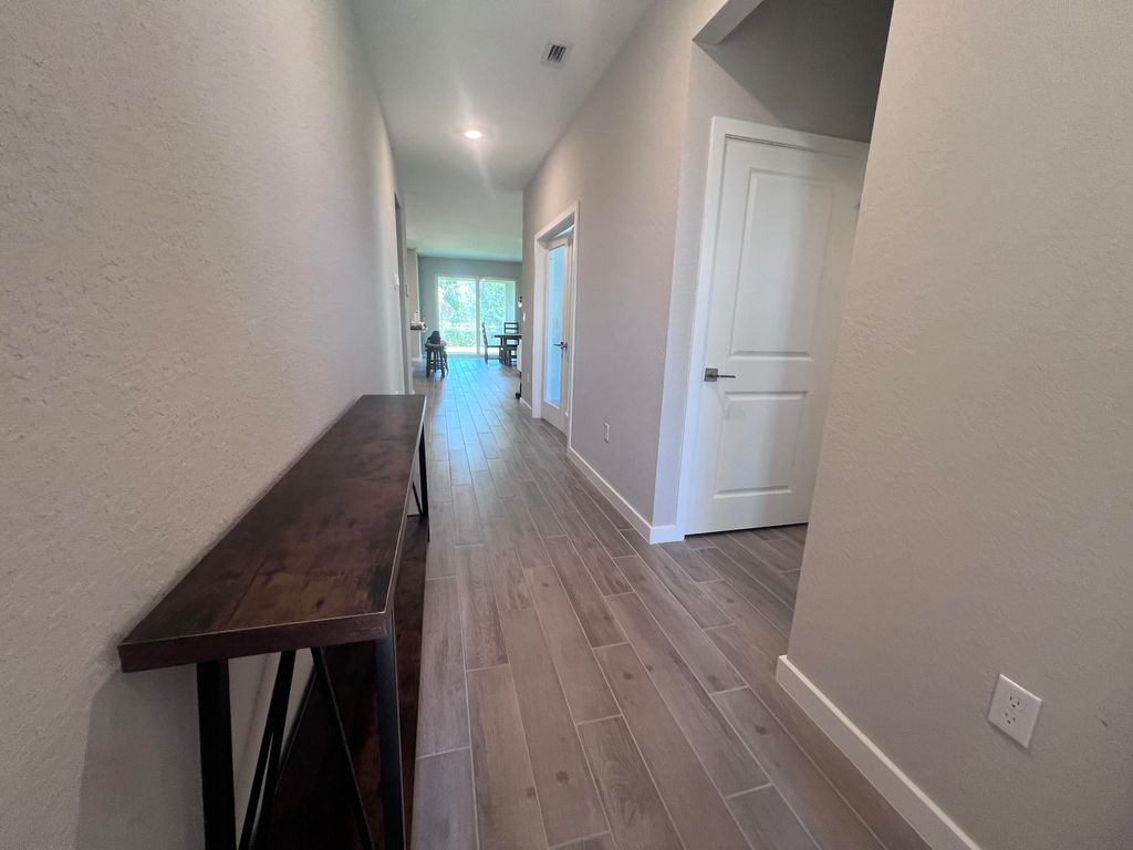 Photo of 2071 NW Golden Oak Trail, Jensen Beach, FL 34957 (MLS # RX-11018348)