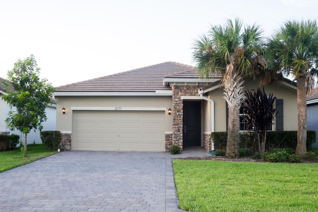 Photo of 2071 NW Golden Oak Trail, Jensen Beach, FL 34957 (MLS # RX-11018348)