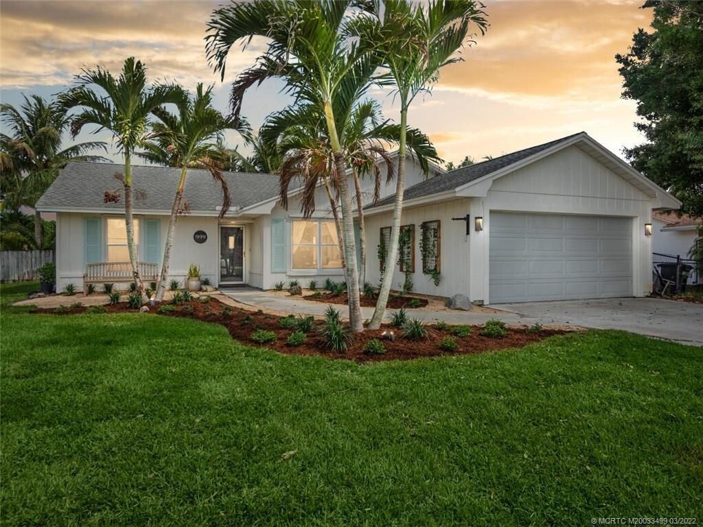 Photo of 1999 NE San Carlos Calle, Jensen Beach, FL 34957 (MLS # RX-10951415)