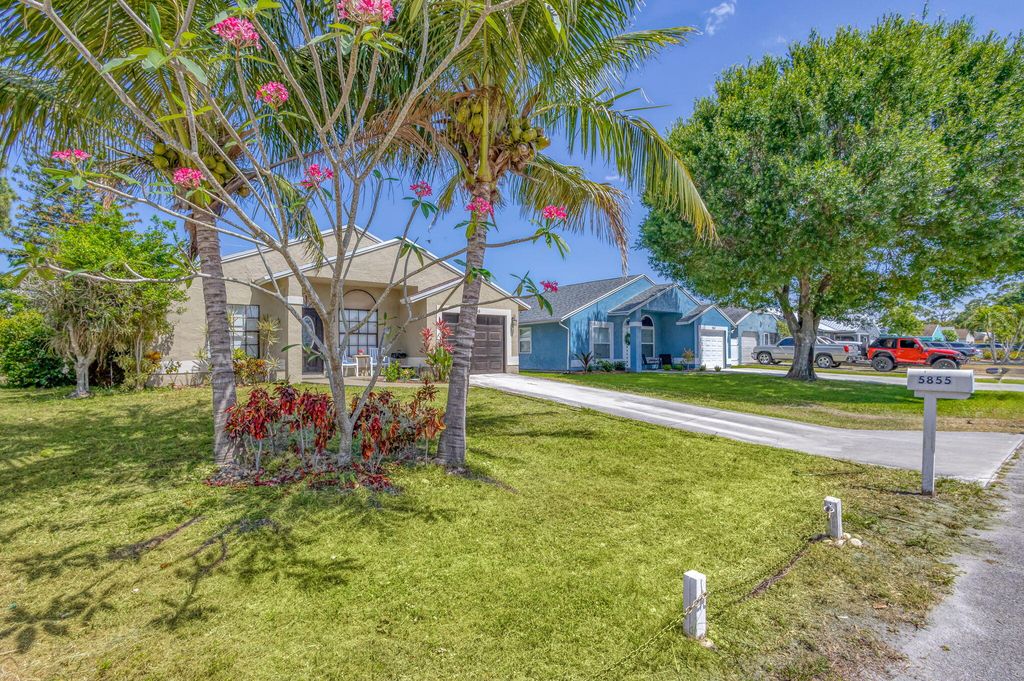 Photo of 5855 SE Mitzi Lane, Stuart, FL 34997 (MLS # RX-11086975)