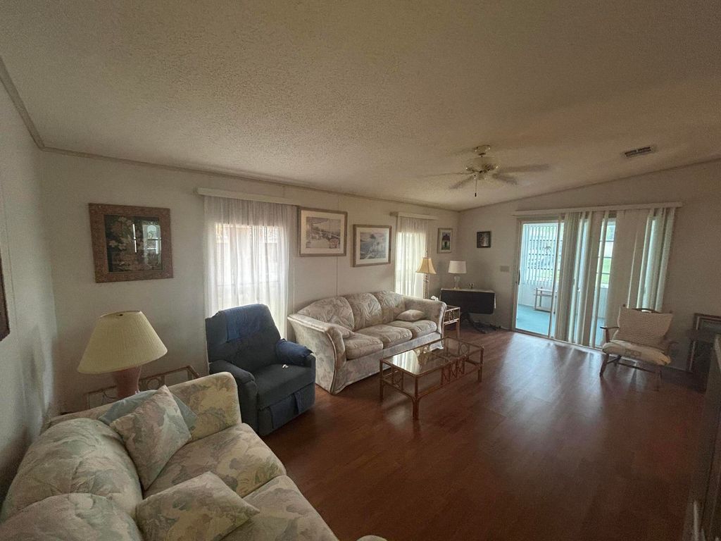 Photo of 6523 Spanish Lakes Blvd Blvd, Fort Pierce, FL 34951 (MLS # RX-11121893)