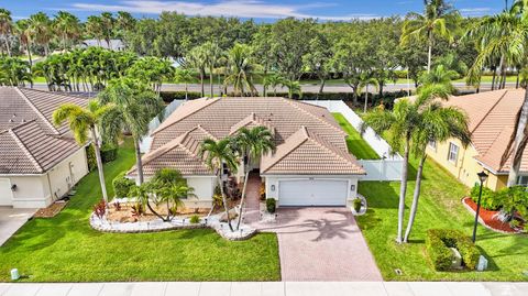 Photo of 5242 Indianwood Village Lane, Lake Worth, FL 33463 (MLS # RX-11129409)