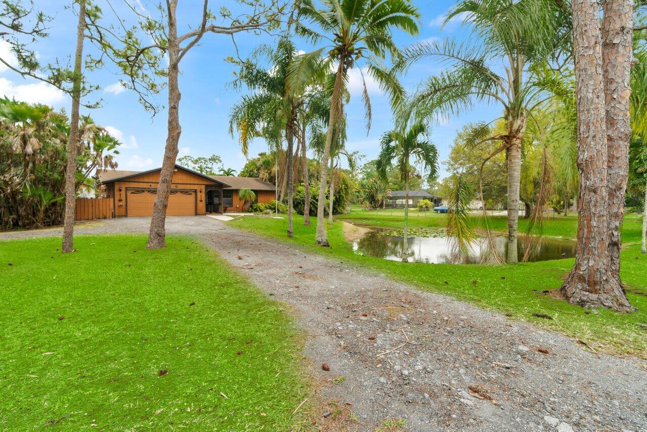 Property for Sale at 4900 122nd Drive, Royal Palm Beach, Palm Beach County, Florida - Bedrooms: 3 
Bathrooms: 2  - $590,000