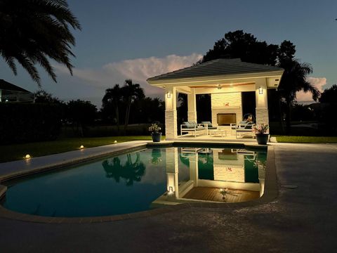 Photo of 15900 Meadow Wood Drive, Wellington, FL 33414 (MLS # RX-11128907)