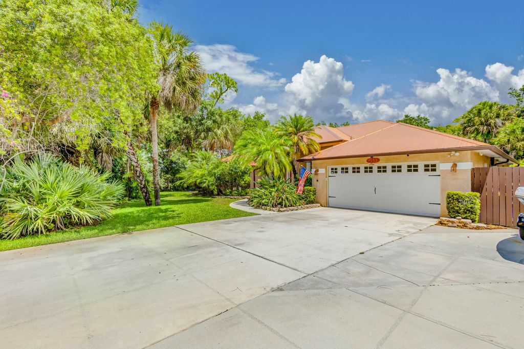 Photo of 1063 SW Blue Water Way, Stuart, FL 34997 (MLS # RX-11081281)