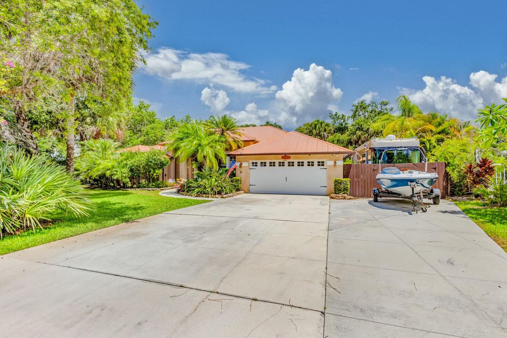 Photo of 1063 SW Blue Water Way, Stuart, FL 34997 (MLS # RX-11081281)