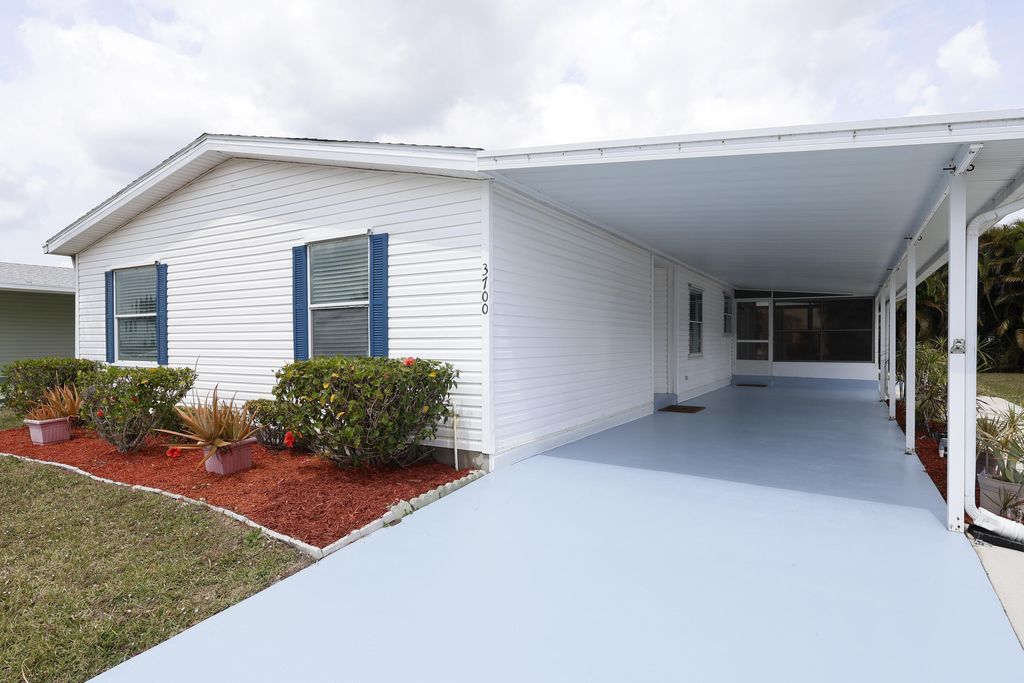 Photo of 3700 Westchester Court, Port Saint Lucie, FL 34952 (MLS # RX-11126651)