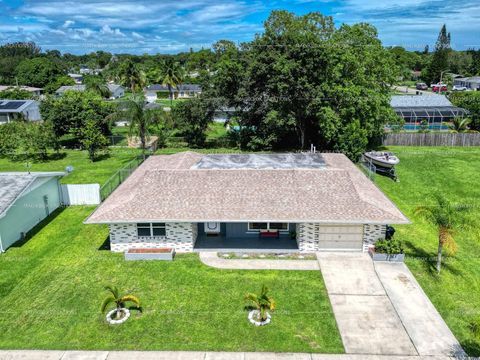 Photo of 213 SW Reynolds Avenue, Port Saint Lucie, FL 34983 (MLS # RX-11129103)