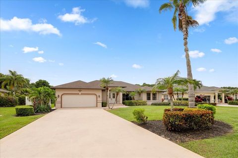 Photo of 174 SE Osprey Ridge, Port Saint Lucie, FL 34984 (MLS # RX-11129379)