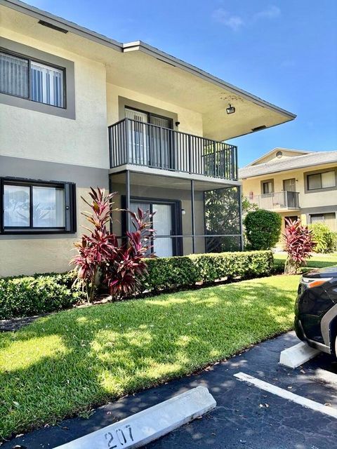 Photo of 610 Trace Circle #107, Deerfield Beach, FL 33441 (MLS # RX-11129708)