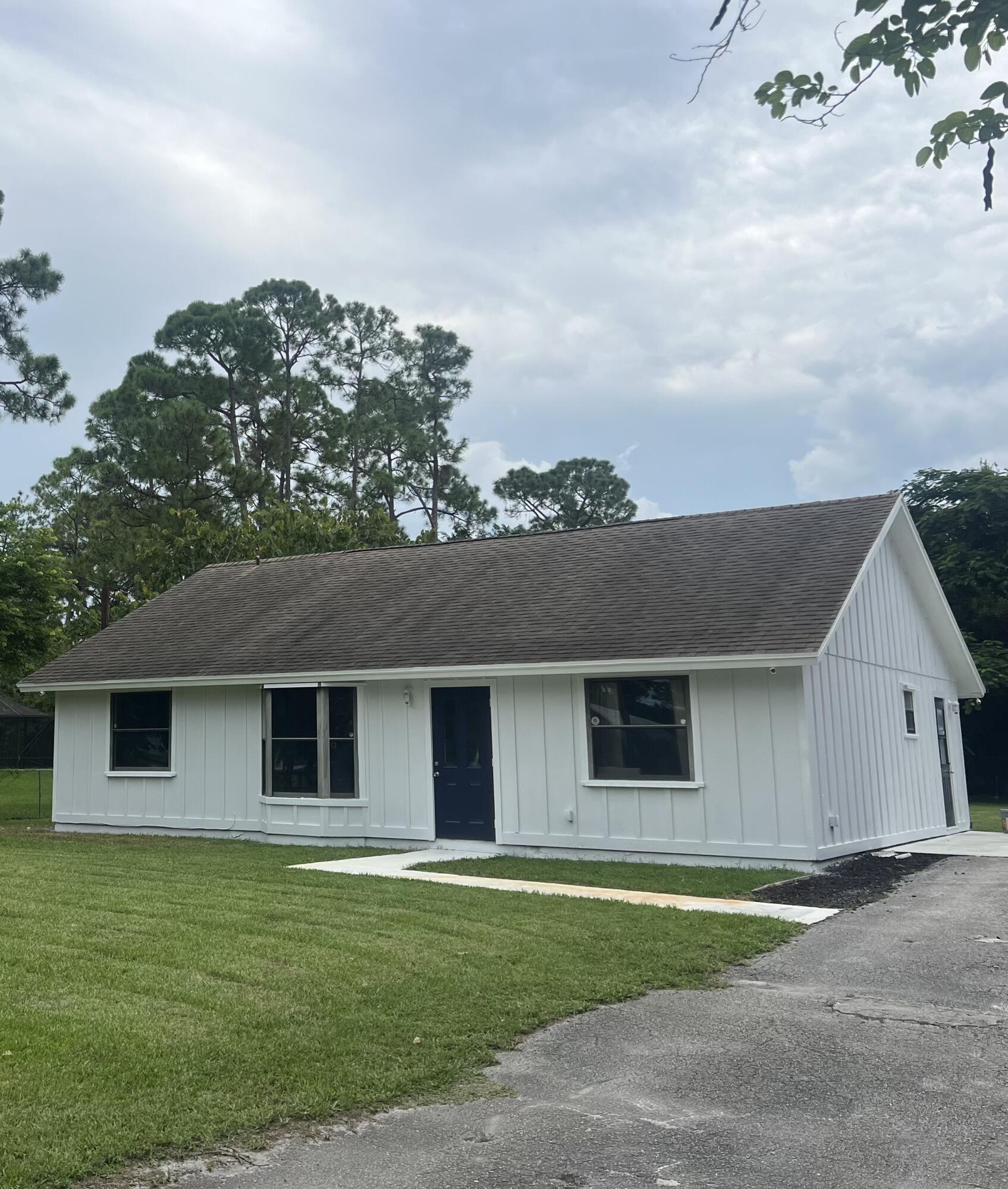 12203 59th Street, The Acreage, Palm Beach County, Florida - 3 Bedrooms  
2 Bathrooms - 