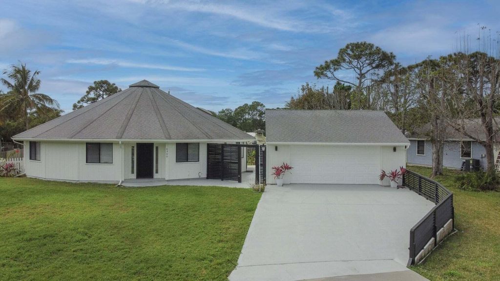 Photo of 6300 SE Phillips Bend Avenue, Stuart, FL 34997 (MLS # RX-11105649)