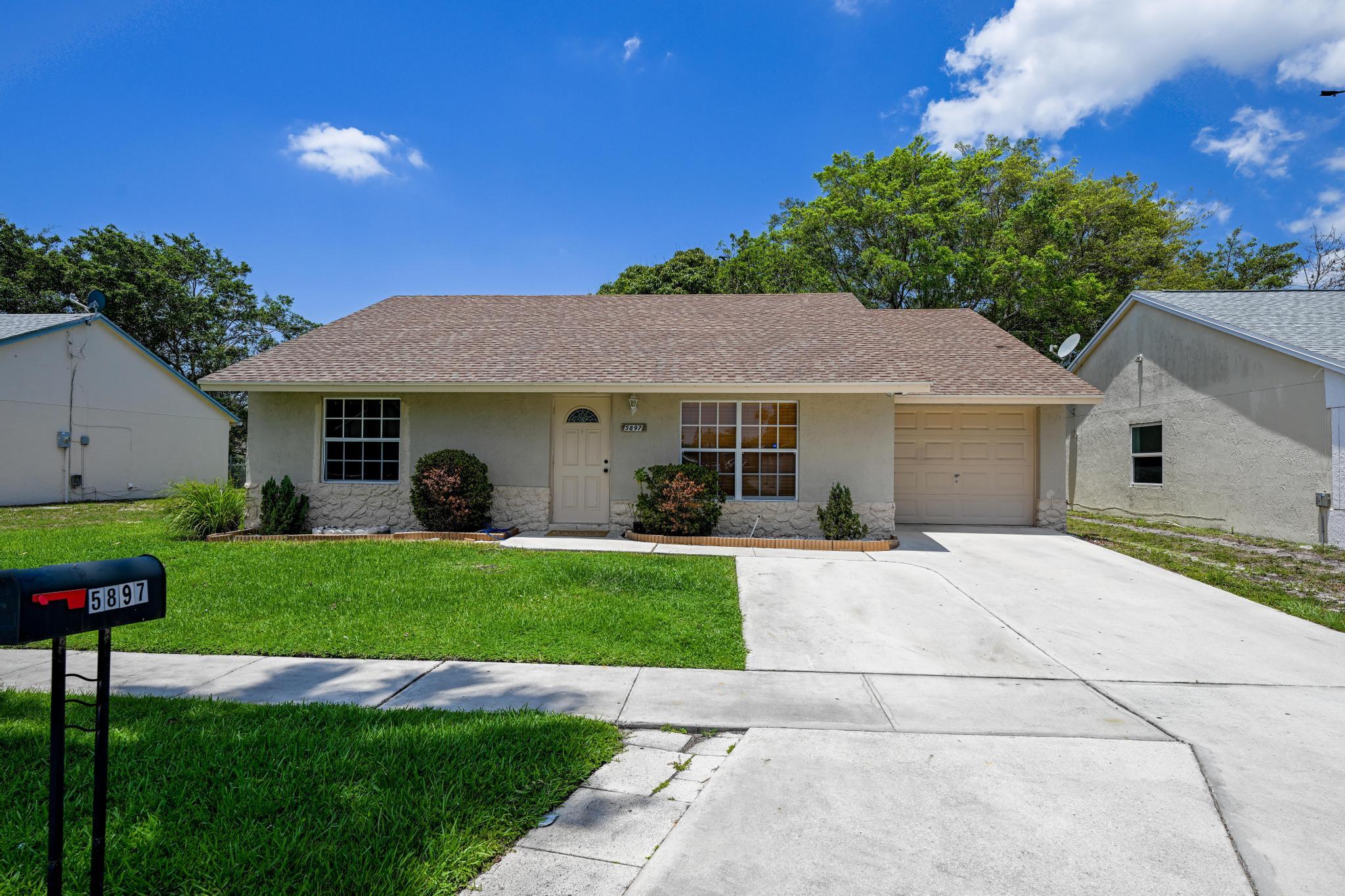 Property for Sale at 5897 Corson Place, Lake Worth, Palm Beach County, Florida - Bedrooms: 4 
Bathrooms: 2  - $425,000