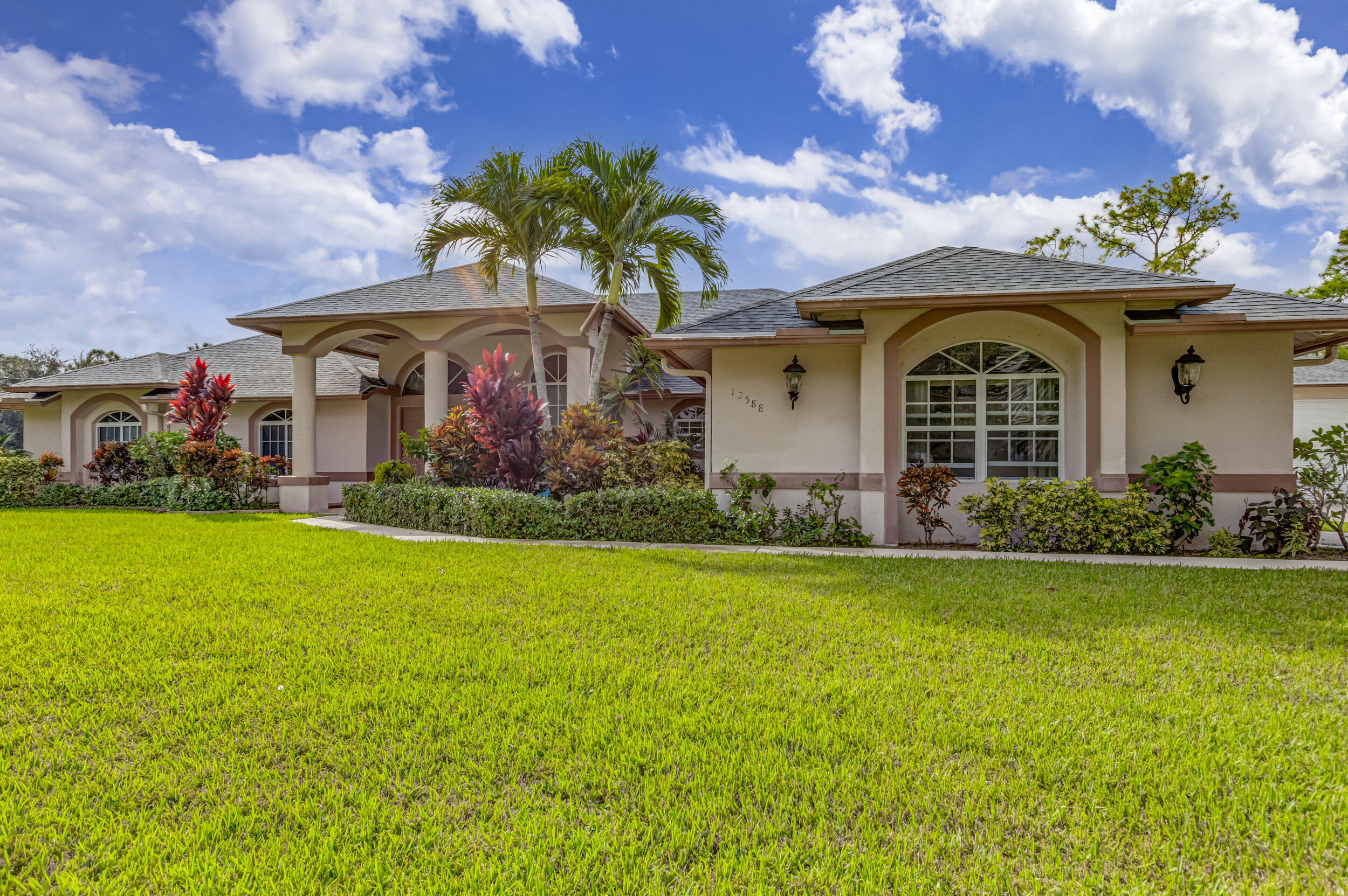 Property for Sale at 12588 78th Place, The Acreage, Palm Beach County, Florida - Bedrooms: 4 
Bathrooms: 3.5  - $925,000