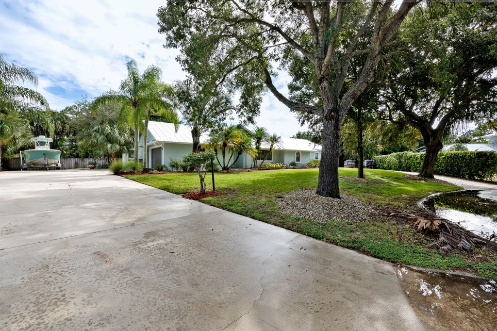 Photo of 1225 SW Magnolia Bluff Drive, Palm City, FL 34990 (MLS # RX-11128271)
