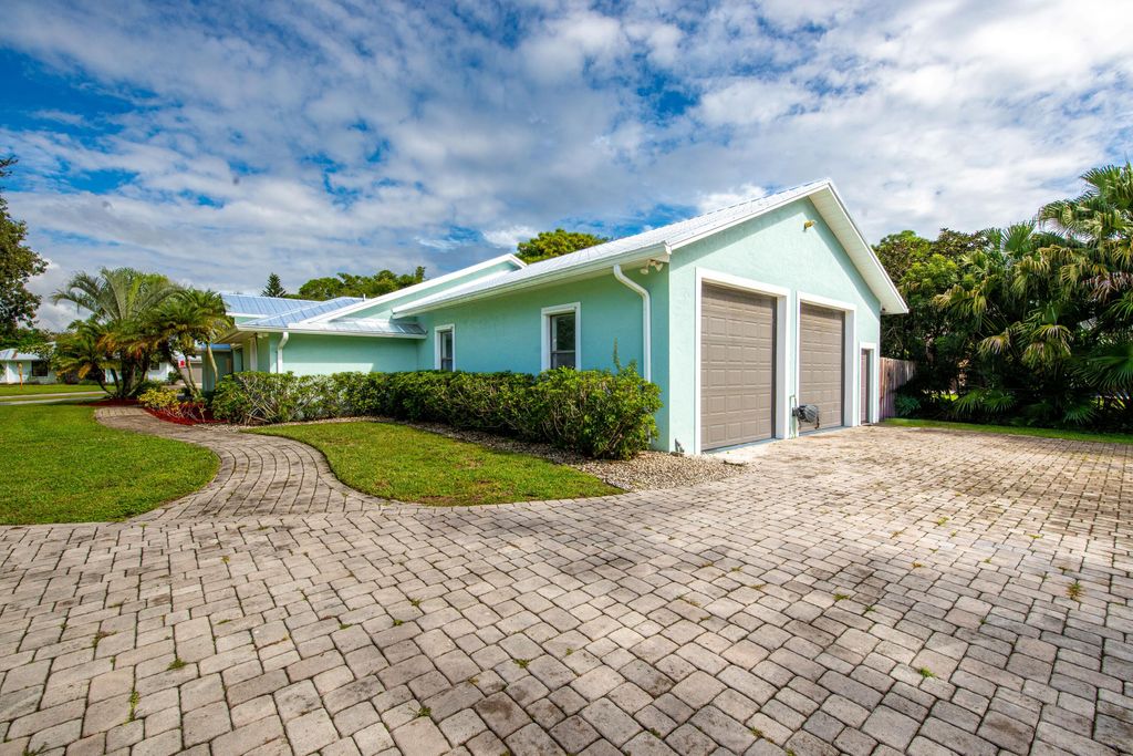 Photo of 1225 SW Magnolia Bluff Drive, Palm City, FL 34990 (MLS # RX-11128271)