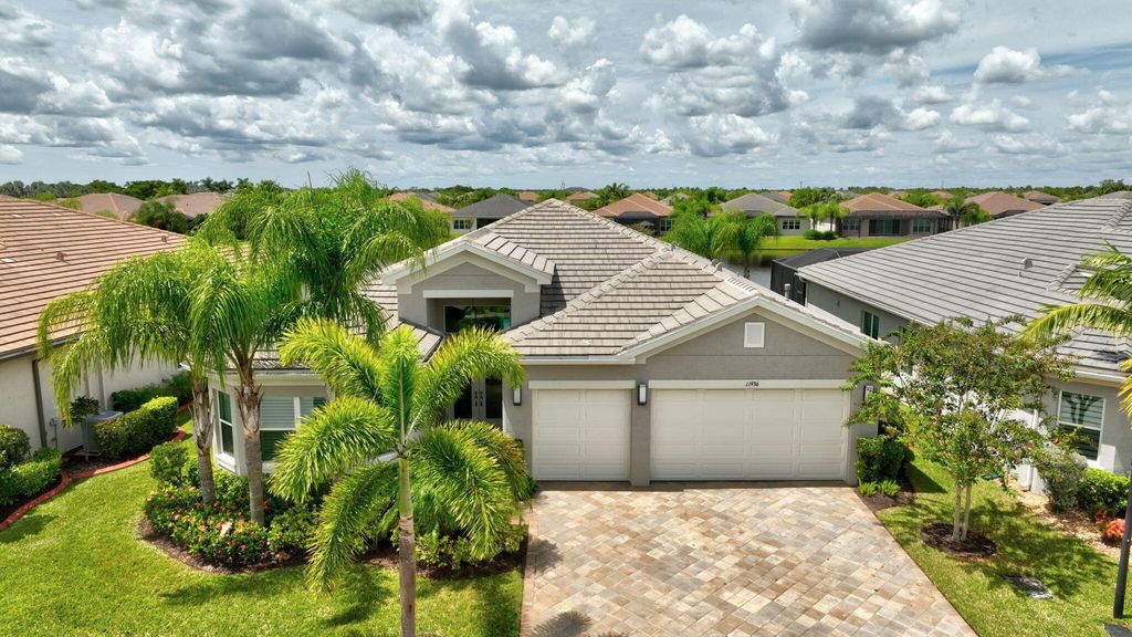 Photo of 11936 SW Marigold Lakes Drive, Port Saint Lucie, FL 34987 (MLS # RX-11121213)