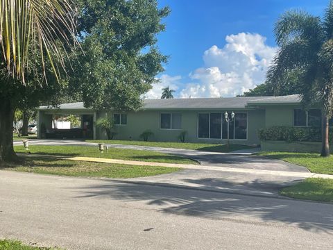 Photo of 1000 Wyoming Avenue, Fort Lauderdale, FL 33312 (MLS # RX-11127606)