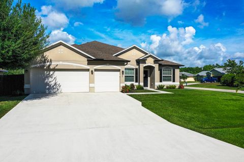 Photo of 4074 SW Kamsler Street, Port Saint Lucie, FL 34953 (MLS # RX-11129432)