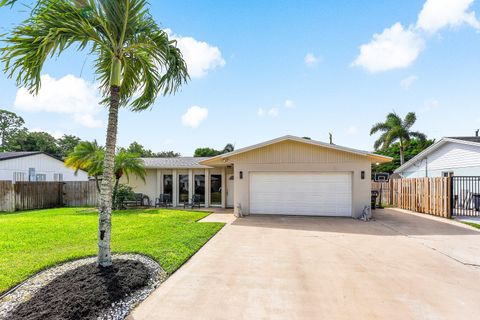 Photo of 7536 Cocoanut Drive, Lake Worth, FL 33467 (MLS # RX-11128856)