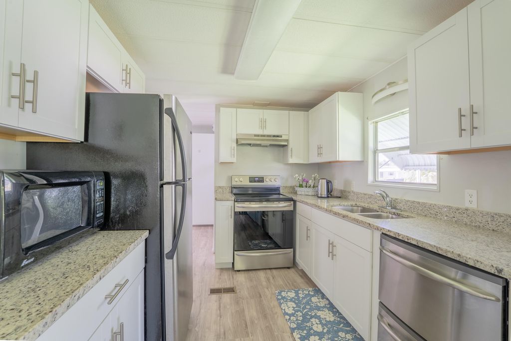 Photo of 176 W Caribbean, Port Saint Lucie, FL 34952 (MLS # RX-11125230)