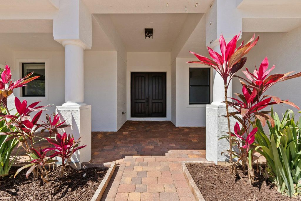 Photo of 2182 NW Dalea Way, Jensen Beach, FL 34957 (MLS # RX-11073672)